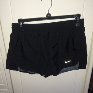 Black Nike running shorts with built in spandex